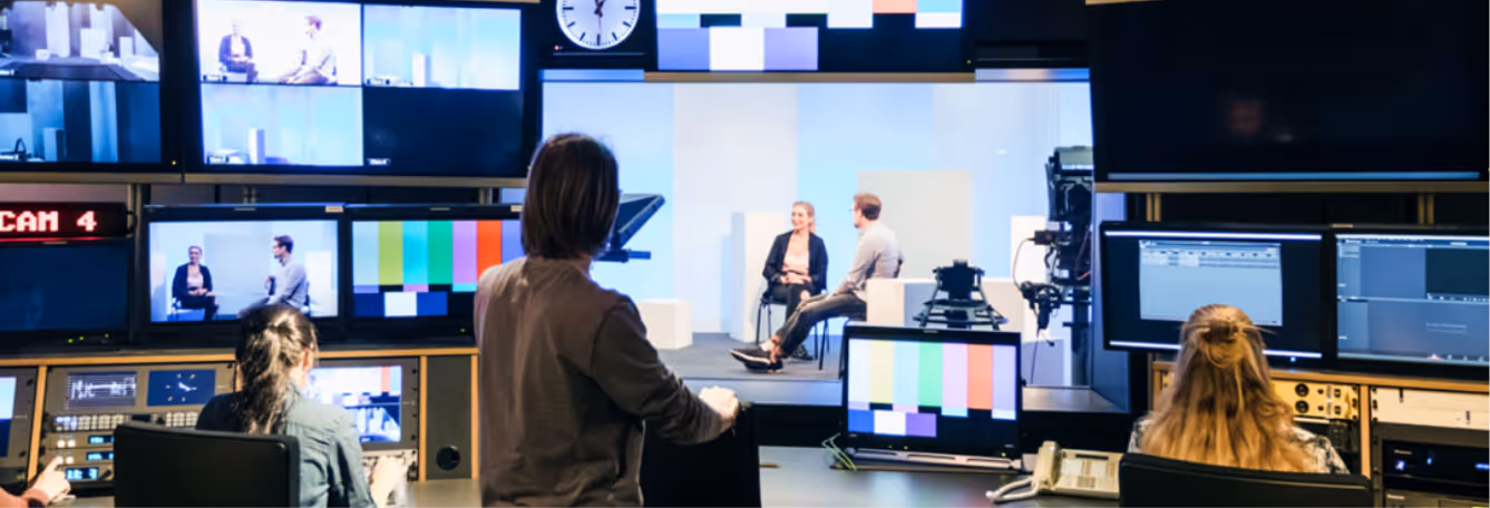 Image of TV studio interview taking place concerning conflict situation overseas