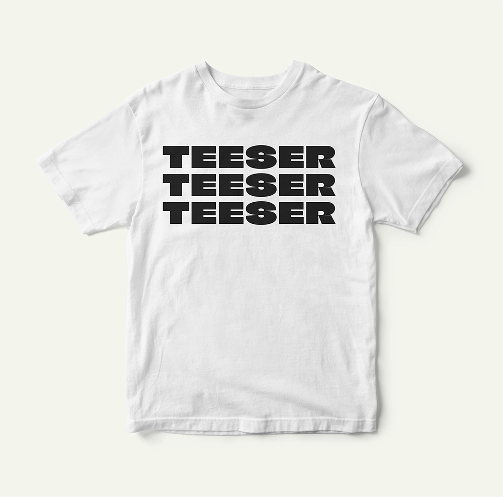 Image of a white t-shirt with the logo printed out three times.