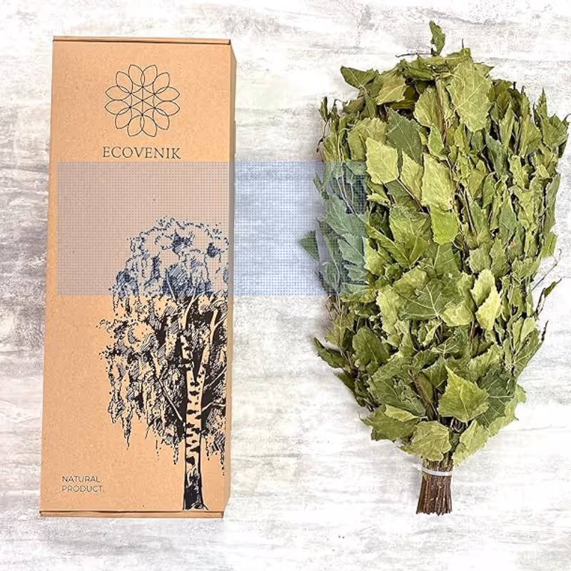 A product photo of a sauna whisk (a leafy bundle of birch branches) displayed next to its packaging.