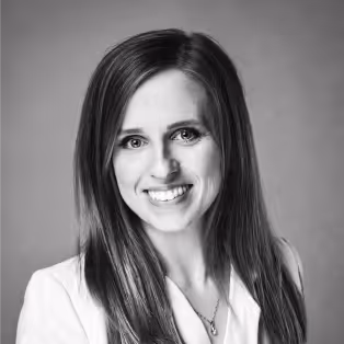 A B&W portrait of a smiling woman