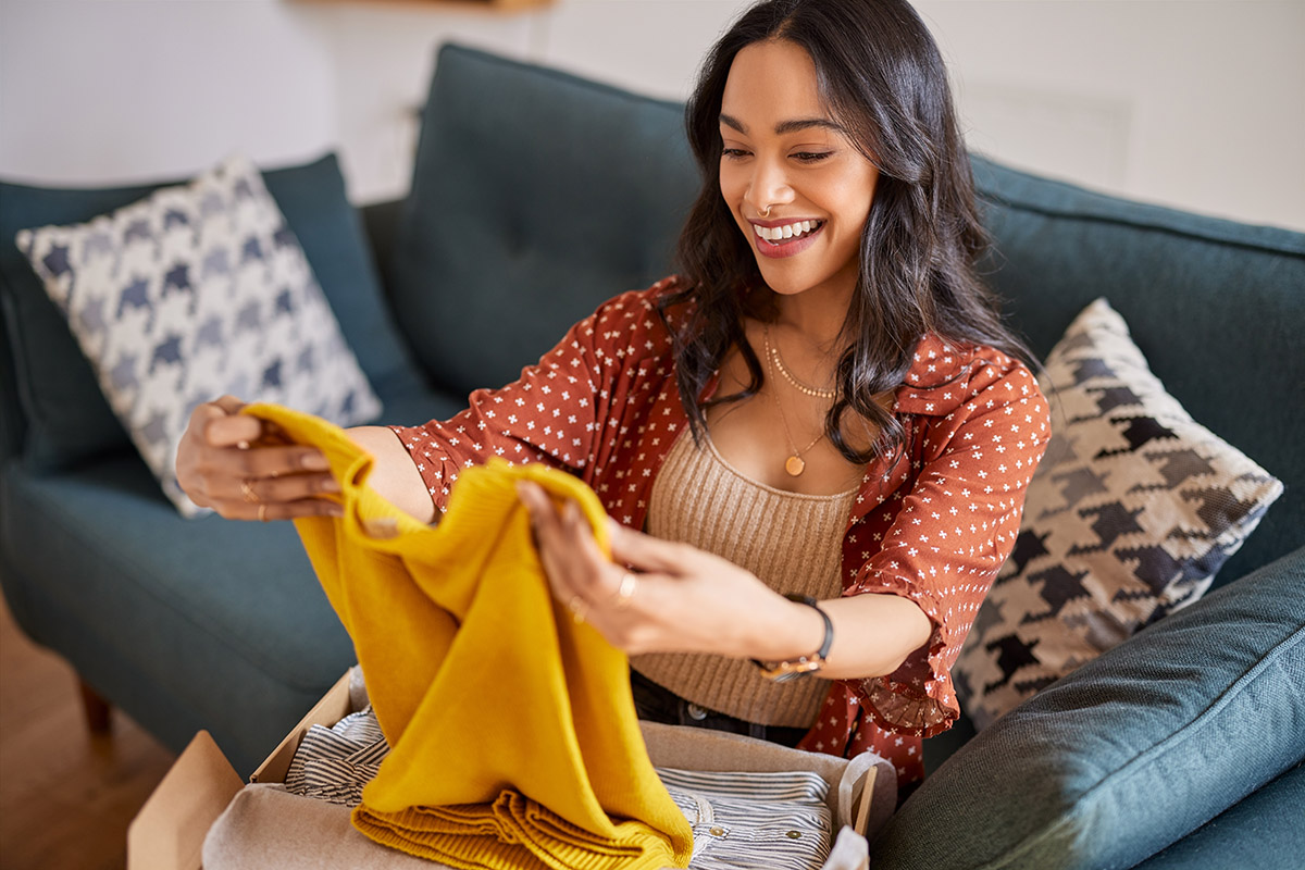 A woman reviewing her online purchase.