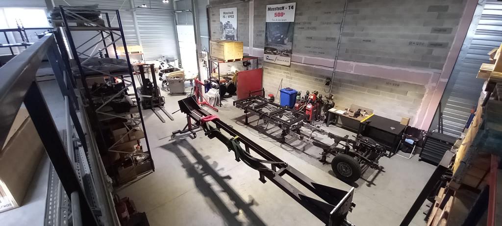 Technamm workshop with chassis and equipment being assembled.