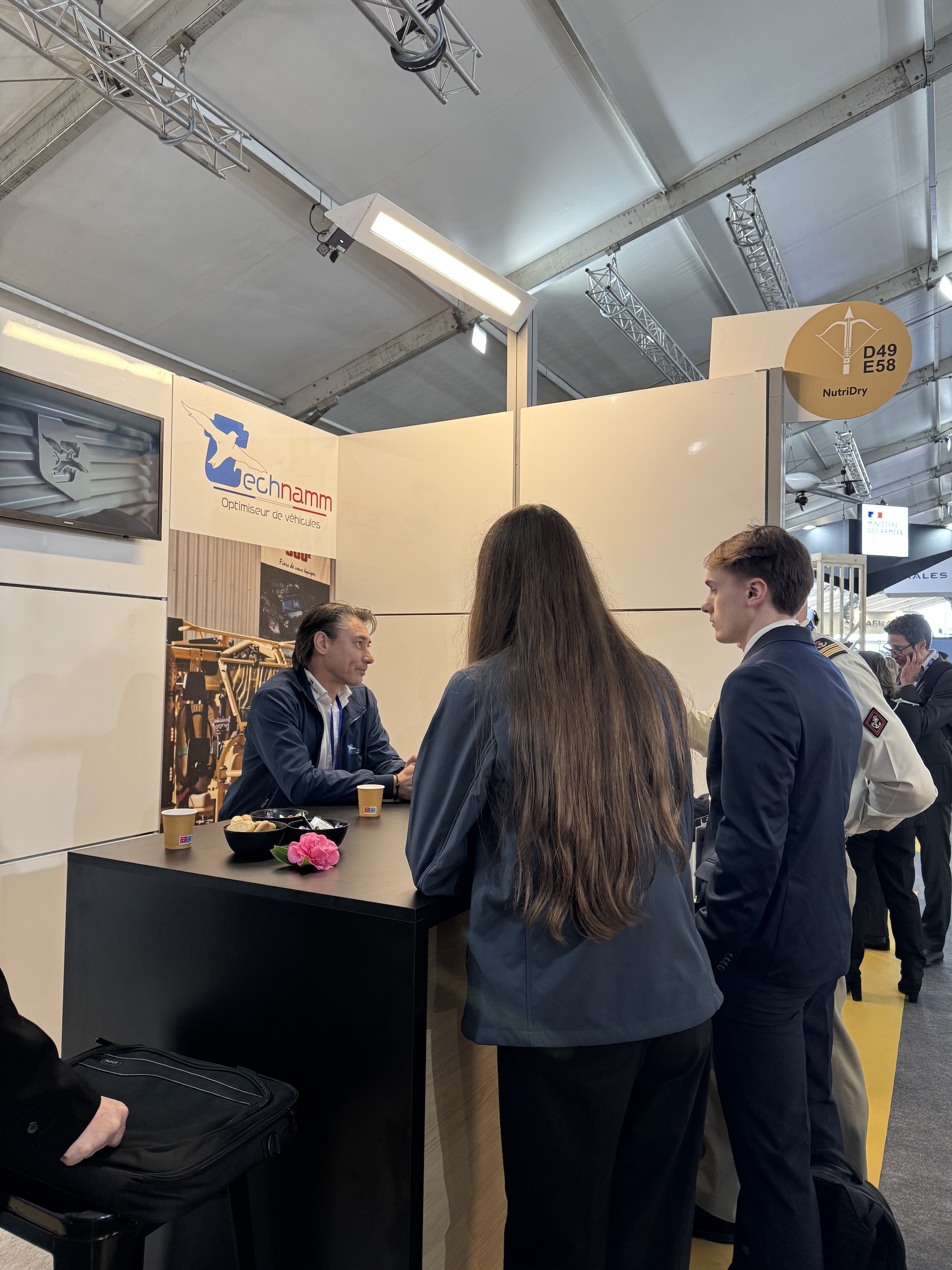 Technamm stand at a trade show dedicated to special-purpose and military vehicles.