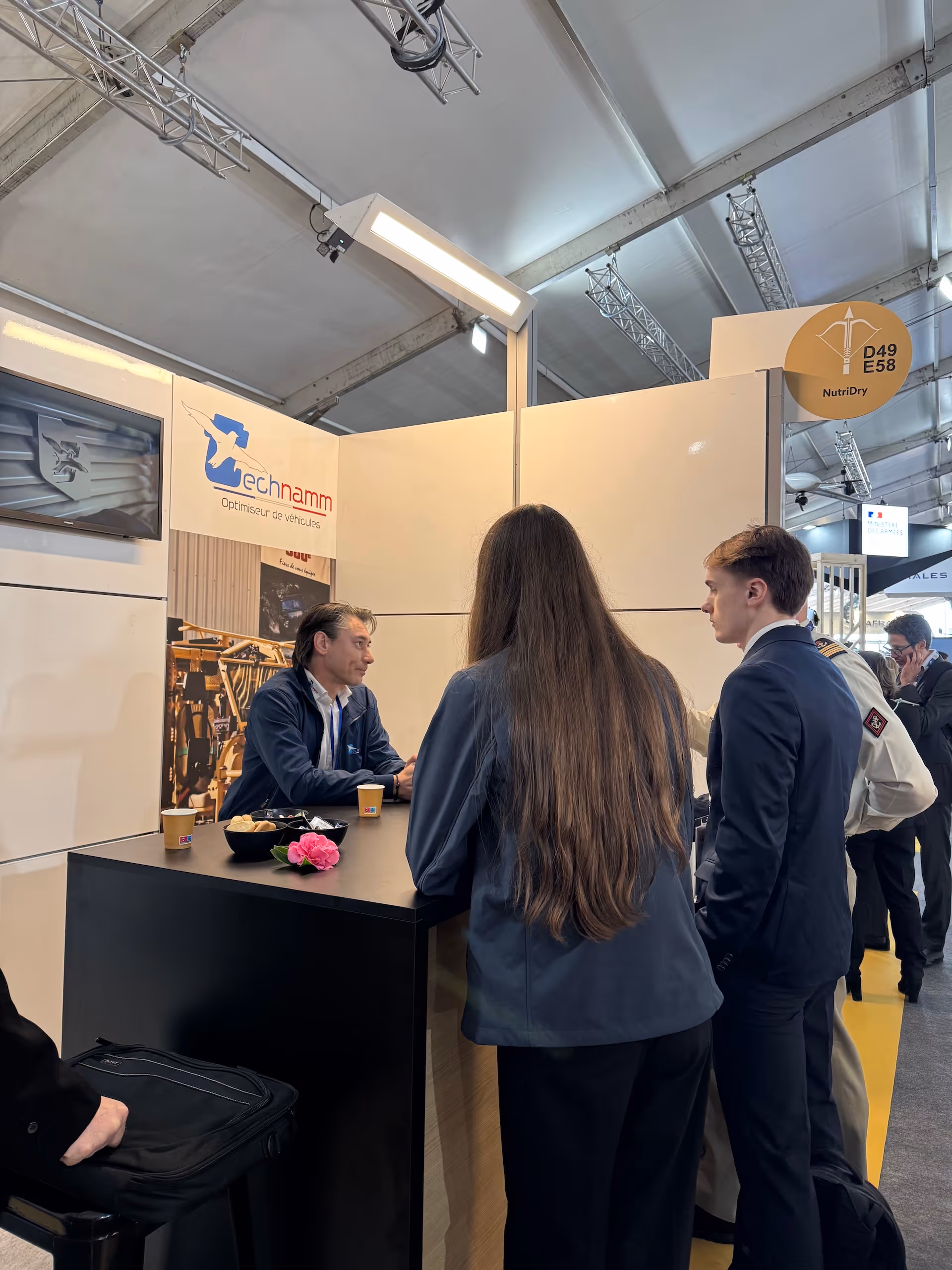Technamm stand at a trade show dedicated to special-purpose and military vehicles.