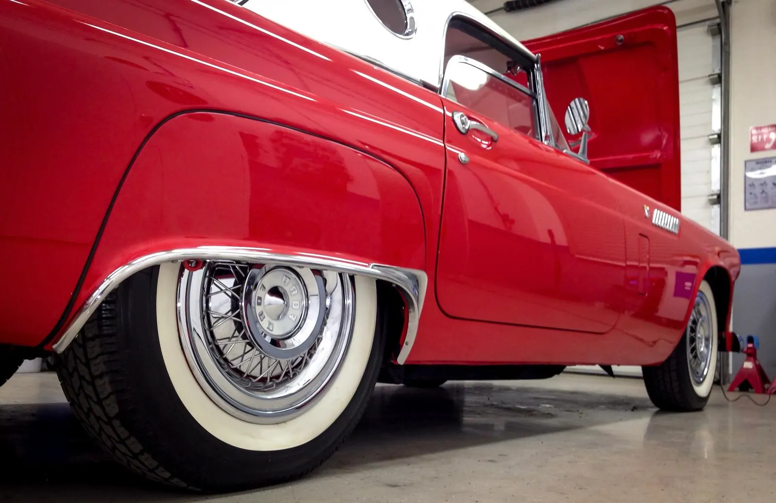A side profile picture of a Ford Thunderbird from 1955