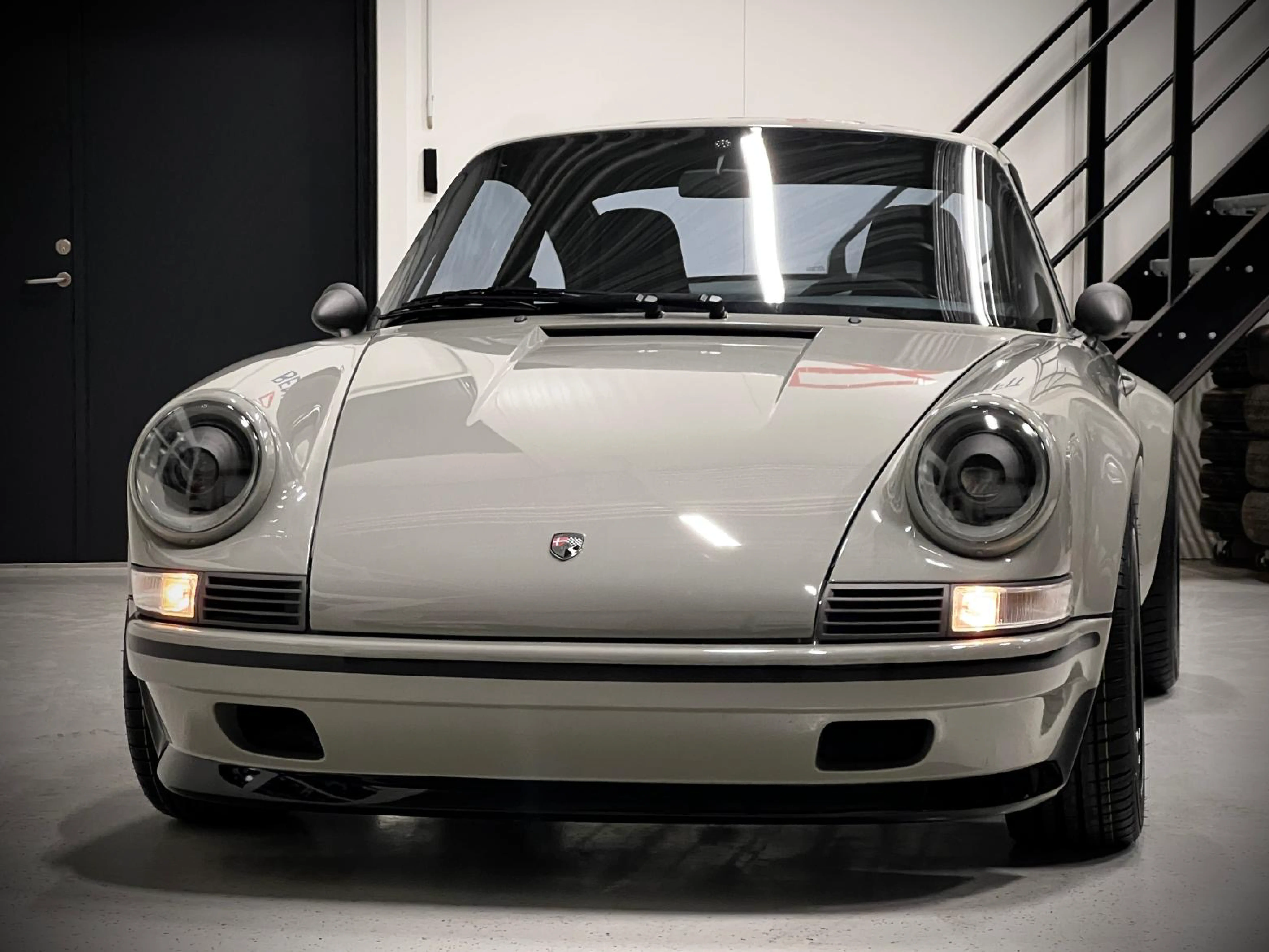 A picture of a Kalmar Automotive Porsche 9-97 Classic in a garage