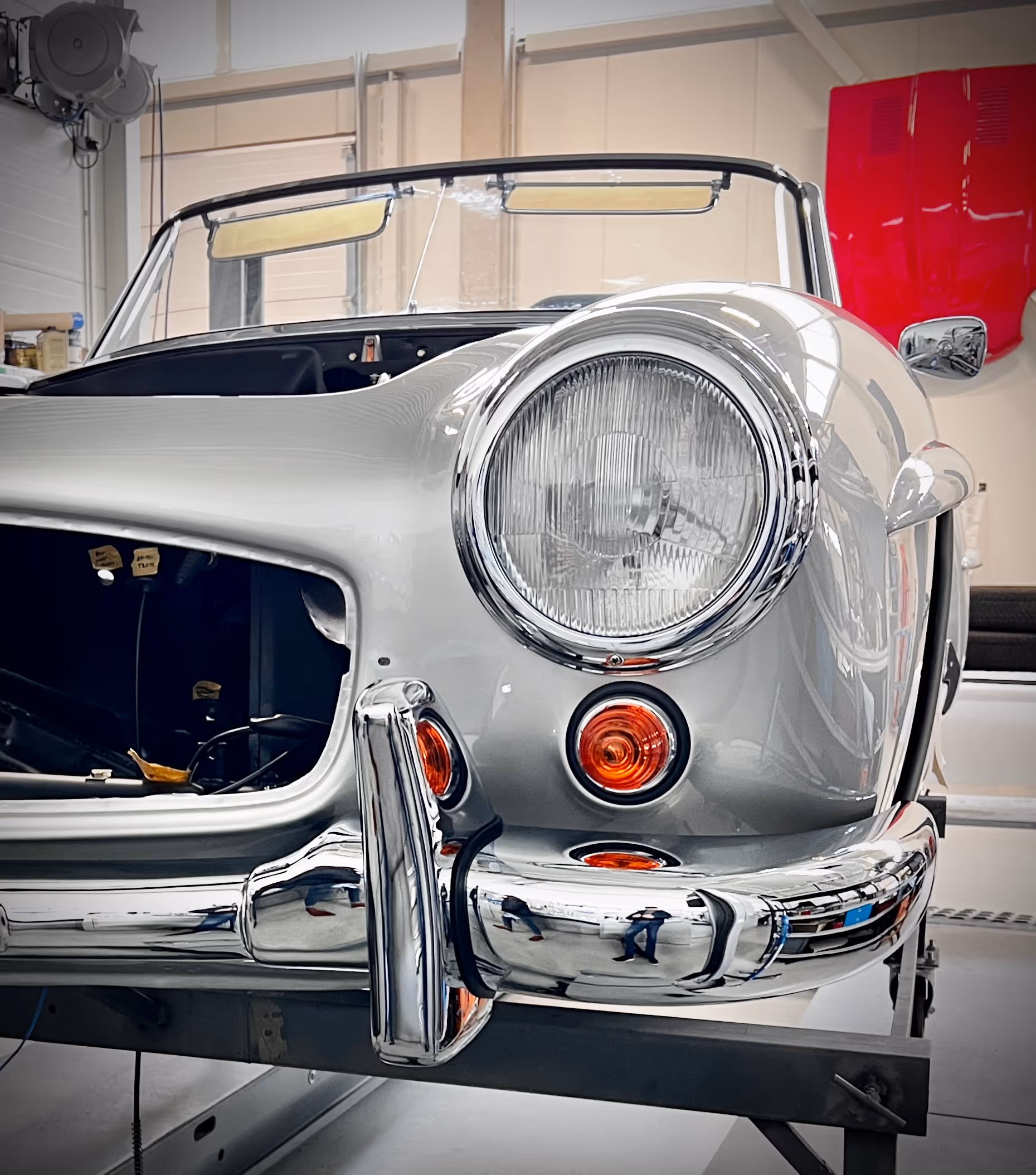 Mercedes-Benz 190SL being restored in a workshop