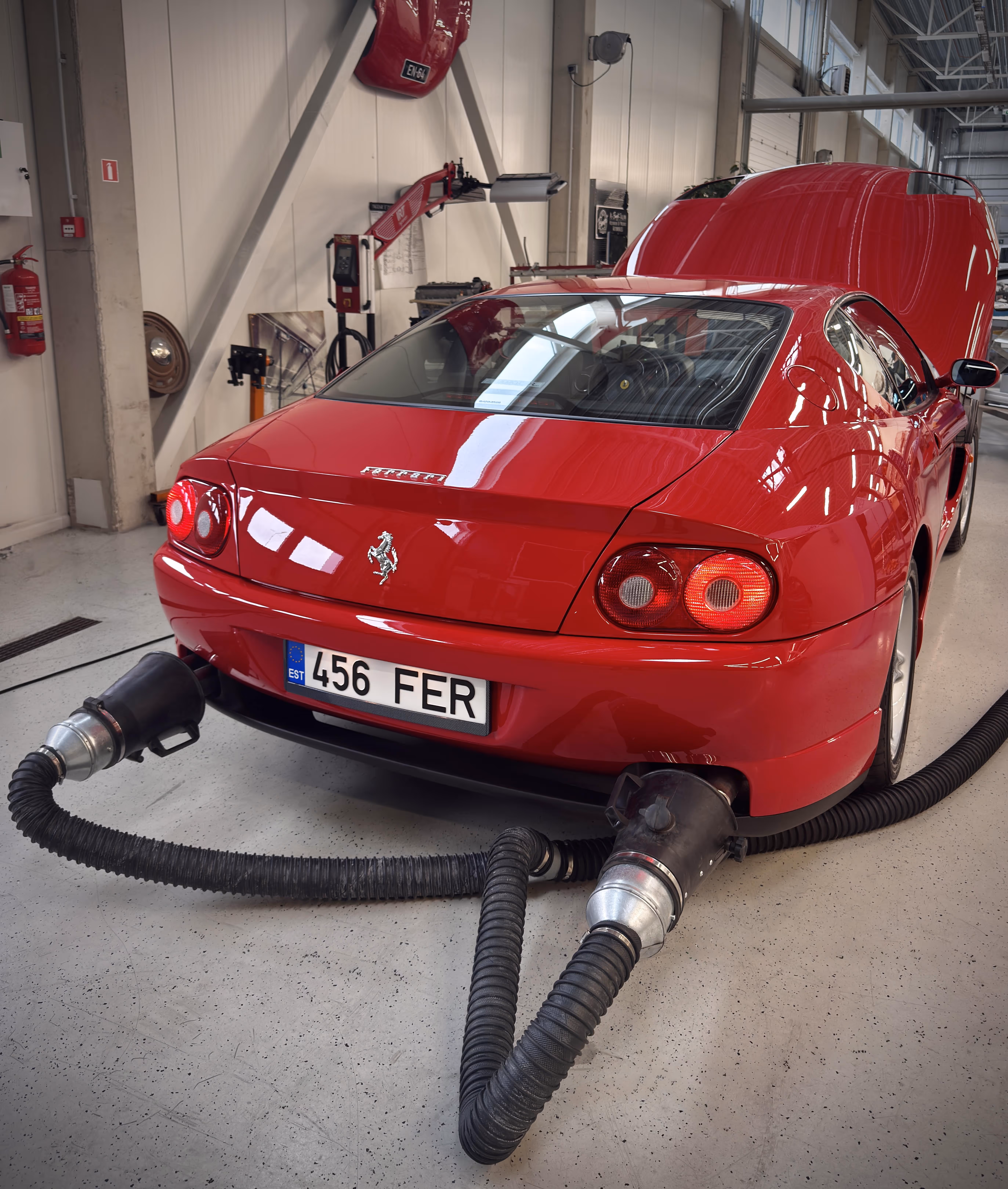 A red Ferrari being tested