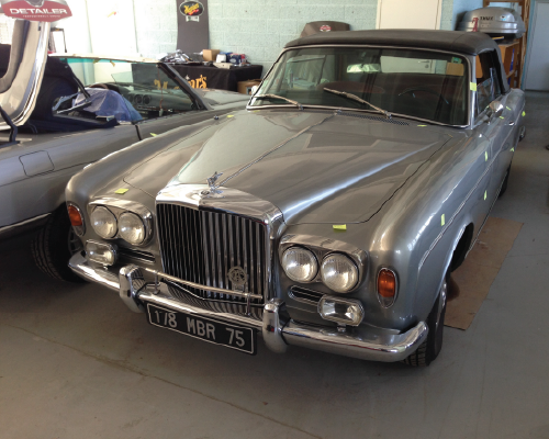 Bentley Corniche in benefit's old building