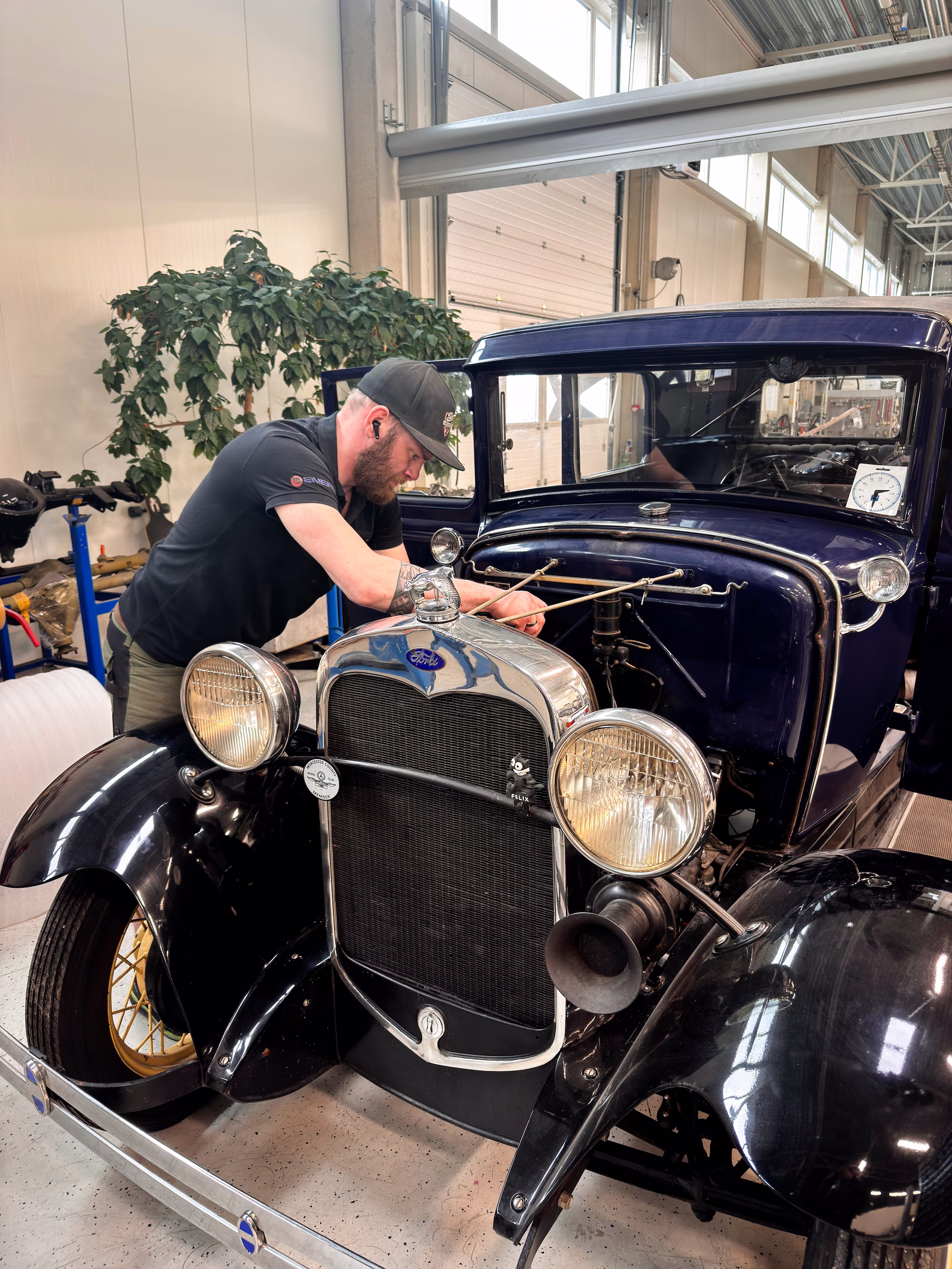 Hendrik Tasa servicing an old Ford Model T