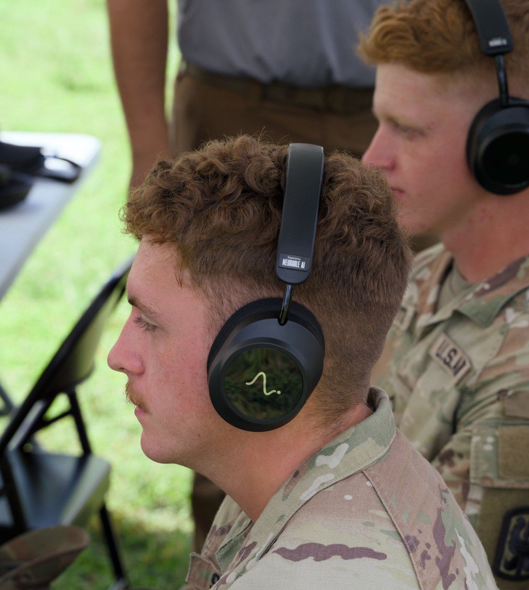 A soldier in the field wearing Neurable headphones