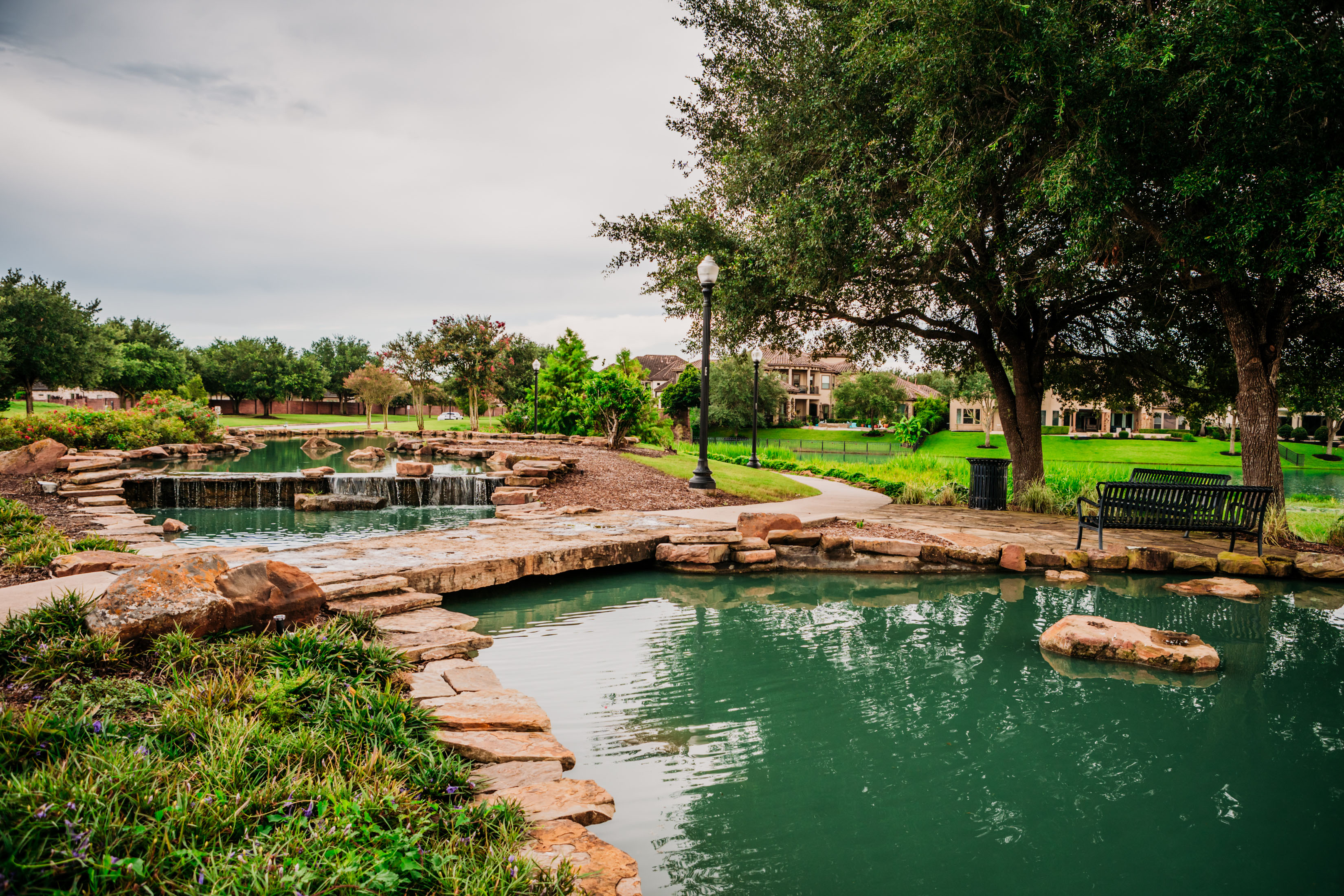 Crossing over the water feature or resting on the outdoor seating