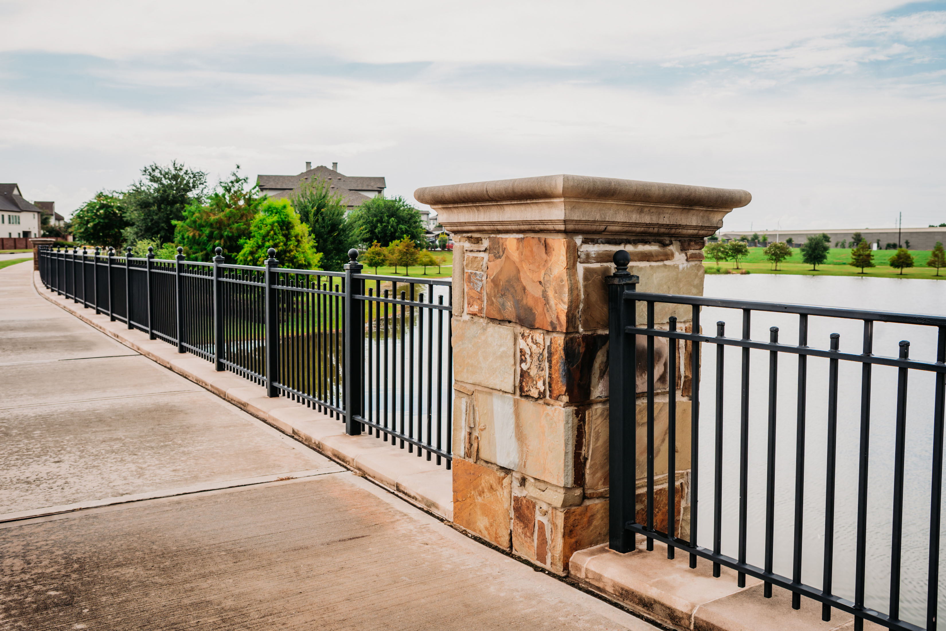 Bridge Rail Fencing with Stone Columns and infill Ornamental Iron Fence