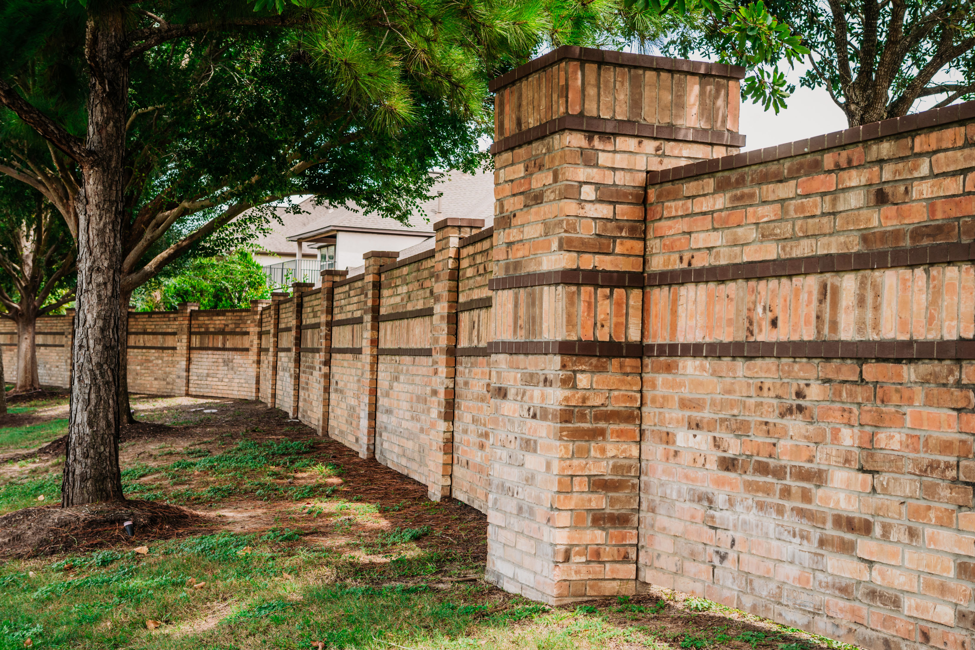 Brick Masonry Perimeter Wall with Decorative Brickwork