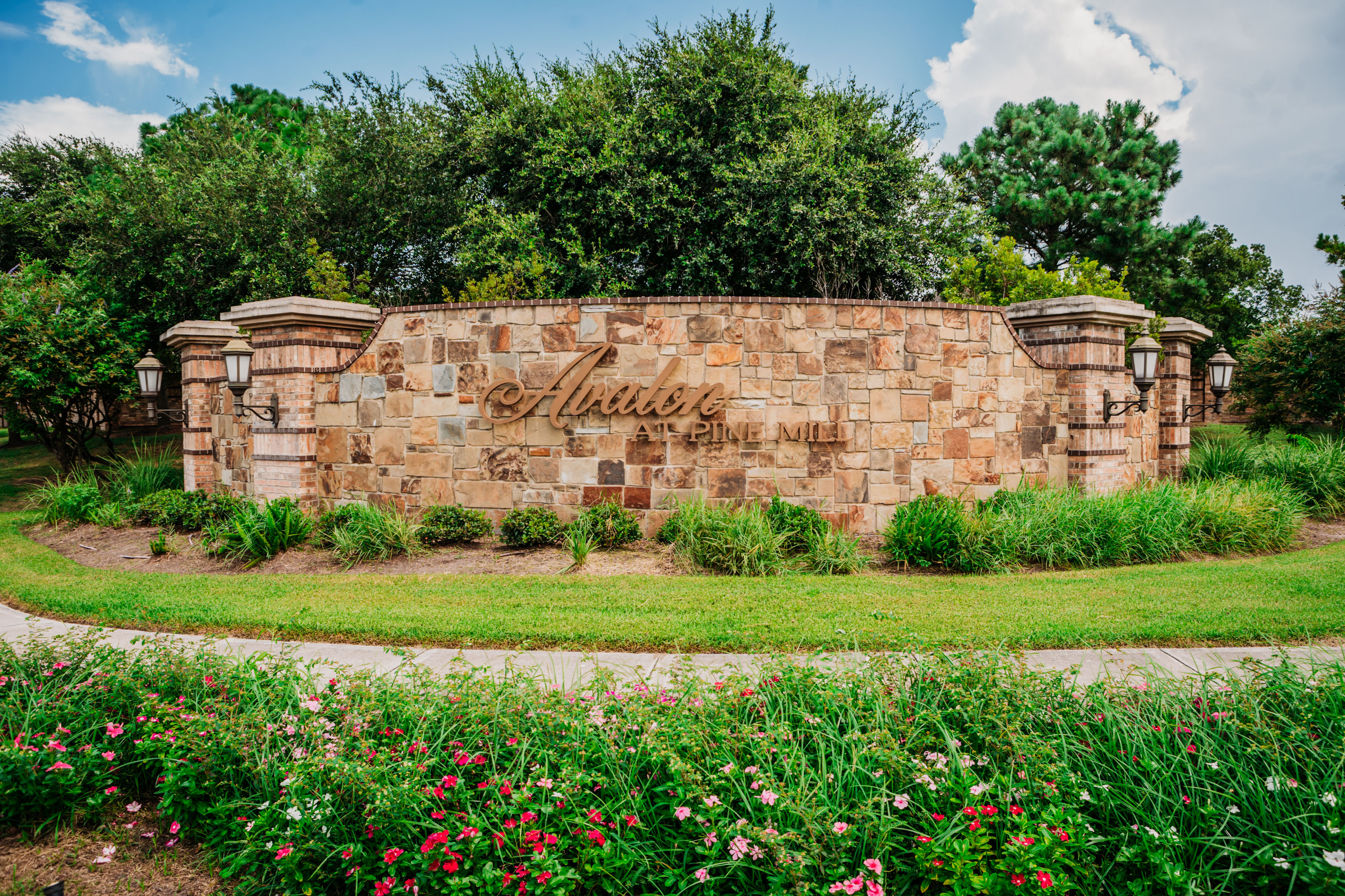 Entry Monument elegantly designed combining Decorative Stone and Brick Masonry