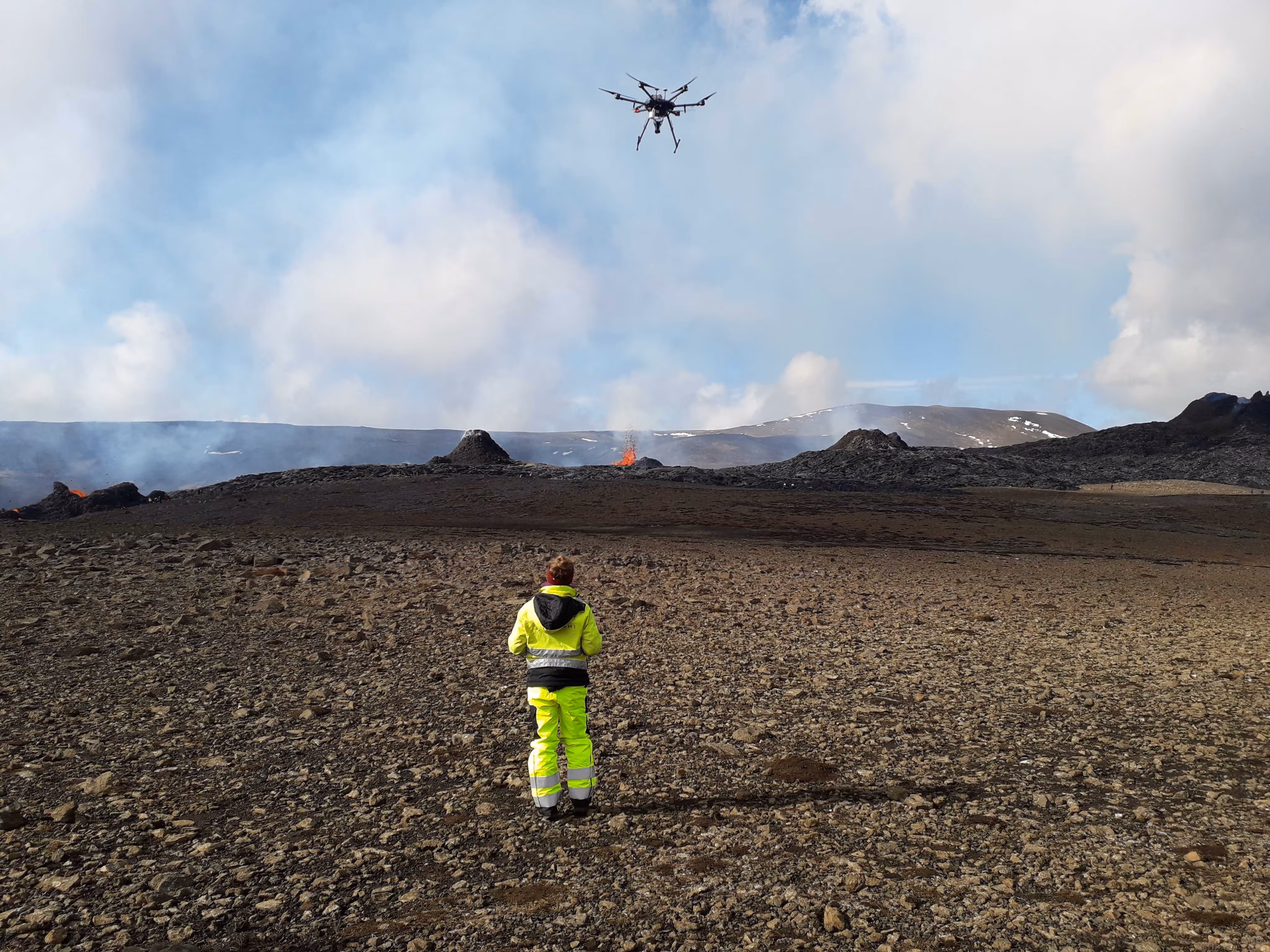 Svarmi Flying A Drone Over Land