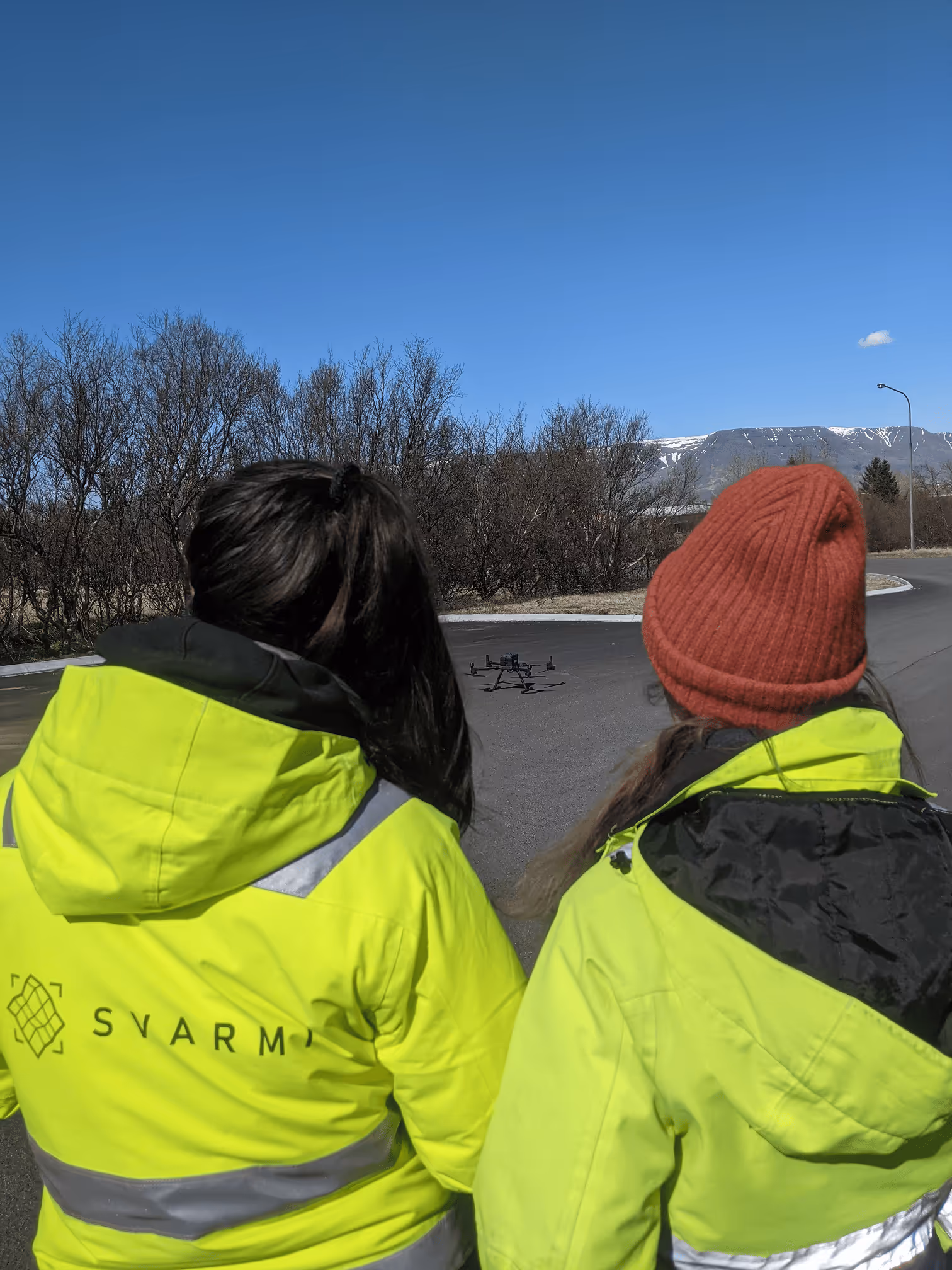 Svarmi employees in High vis jackets doing survey work | Svarmi