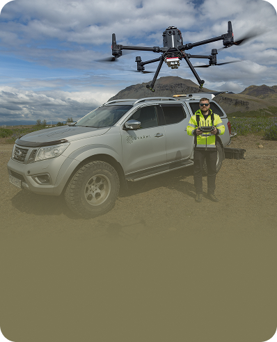 Data Collection Drone being flown next to a Svarmi Van.