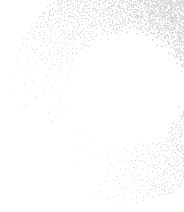 Circular pattern of scattered small white dots on black background forming a ring shape.