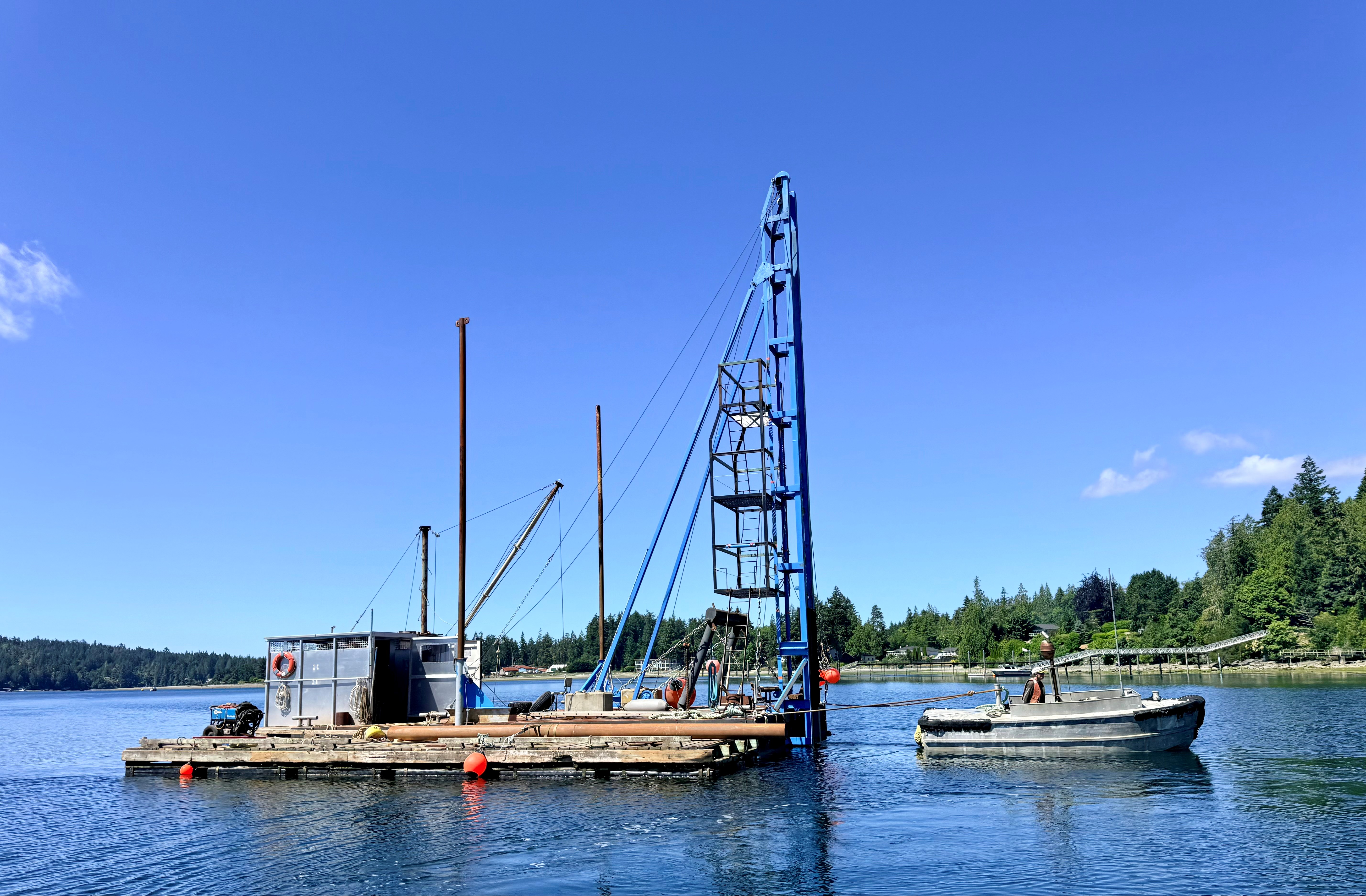 Steel beams being moved across dock