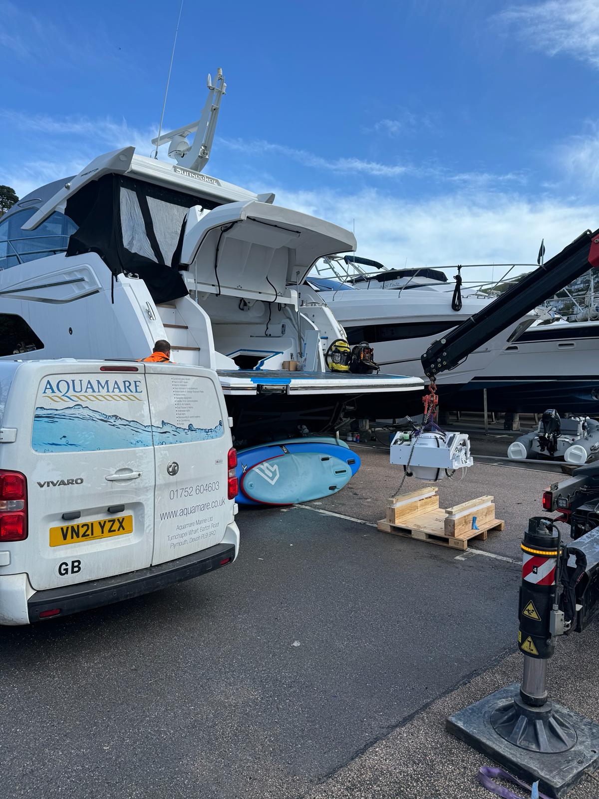 Equipment safely lifted onto the yacht, ready for precise installation