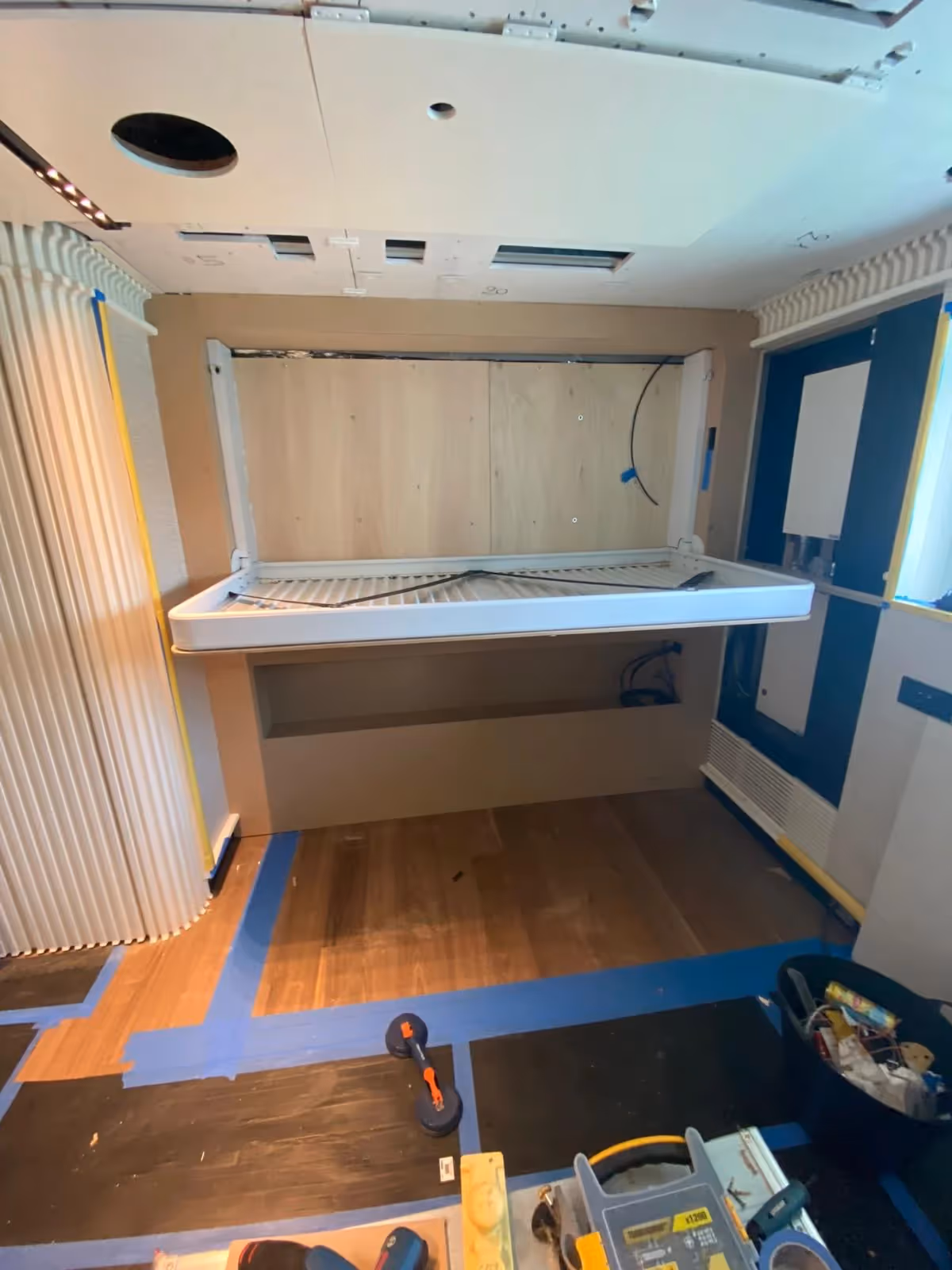 Early installation stage of the fold-down bed, designed for flexible accommodation