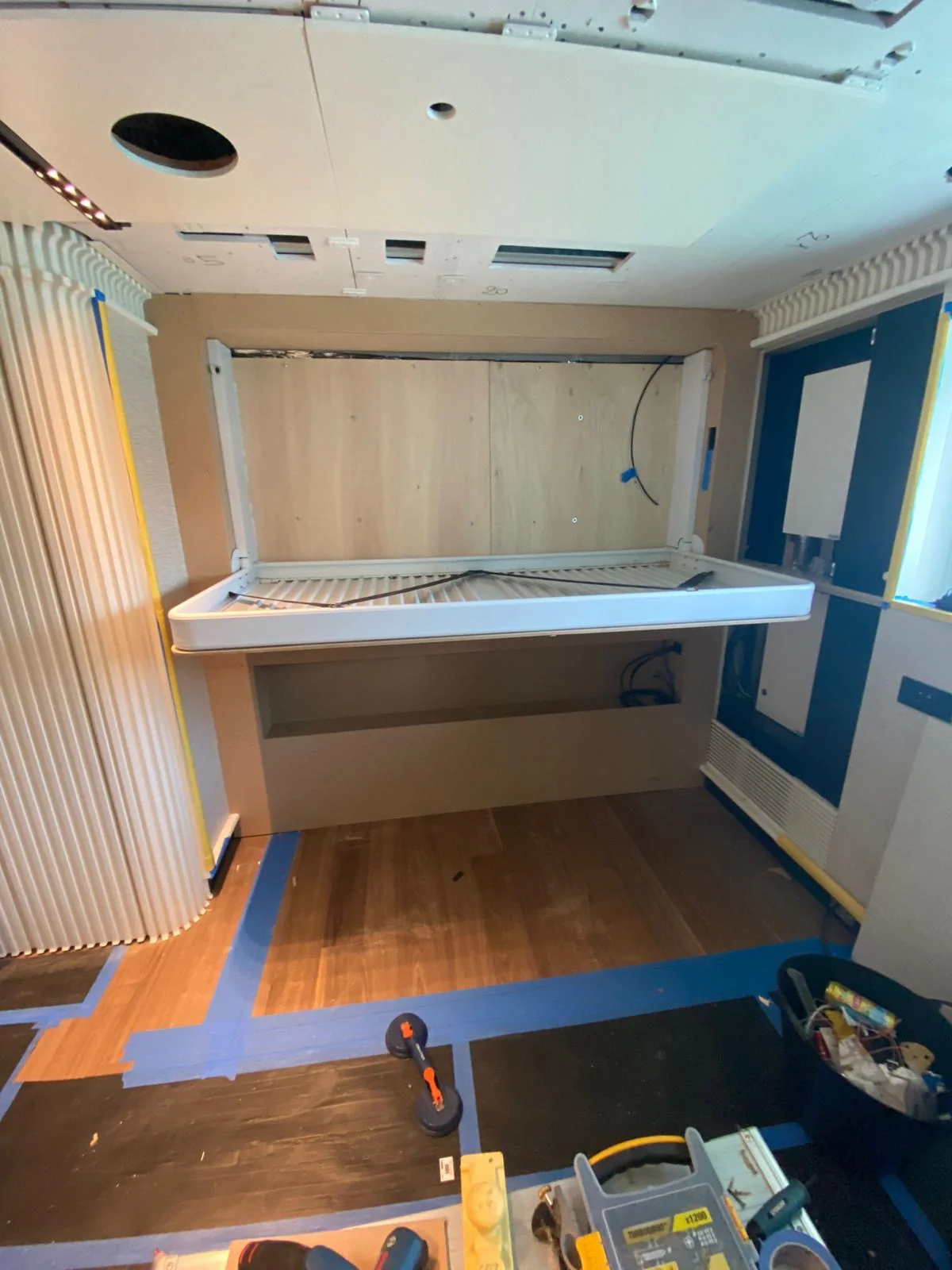 Early installation stage of the fold-down bed, designed for flexible accommodation