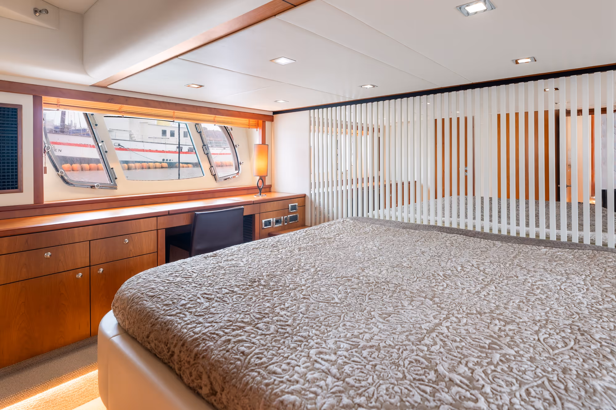 Custom-fitted desk area in the bedroom enables comfortable work on the move
