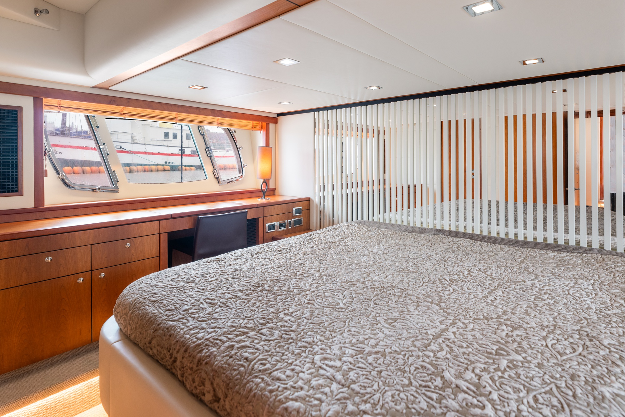 Custom-fitted desk area in the bedroom enables comfortable work on the move