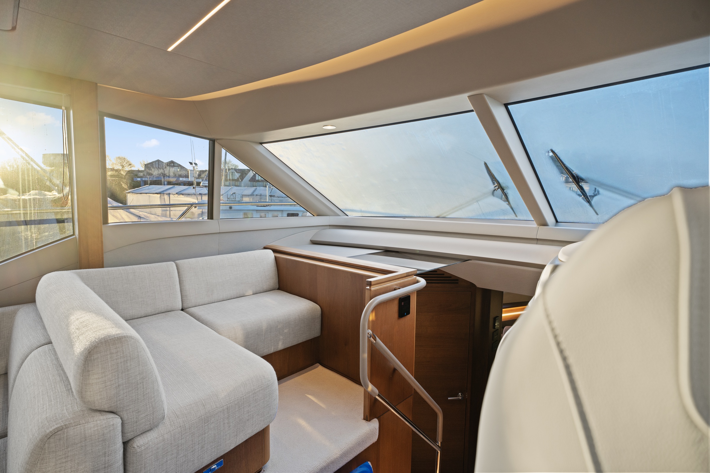 Elegant teak finishes expertly applied to the staircase, ensuring quality extends to every corner of the vessel