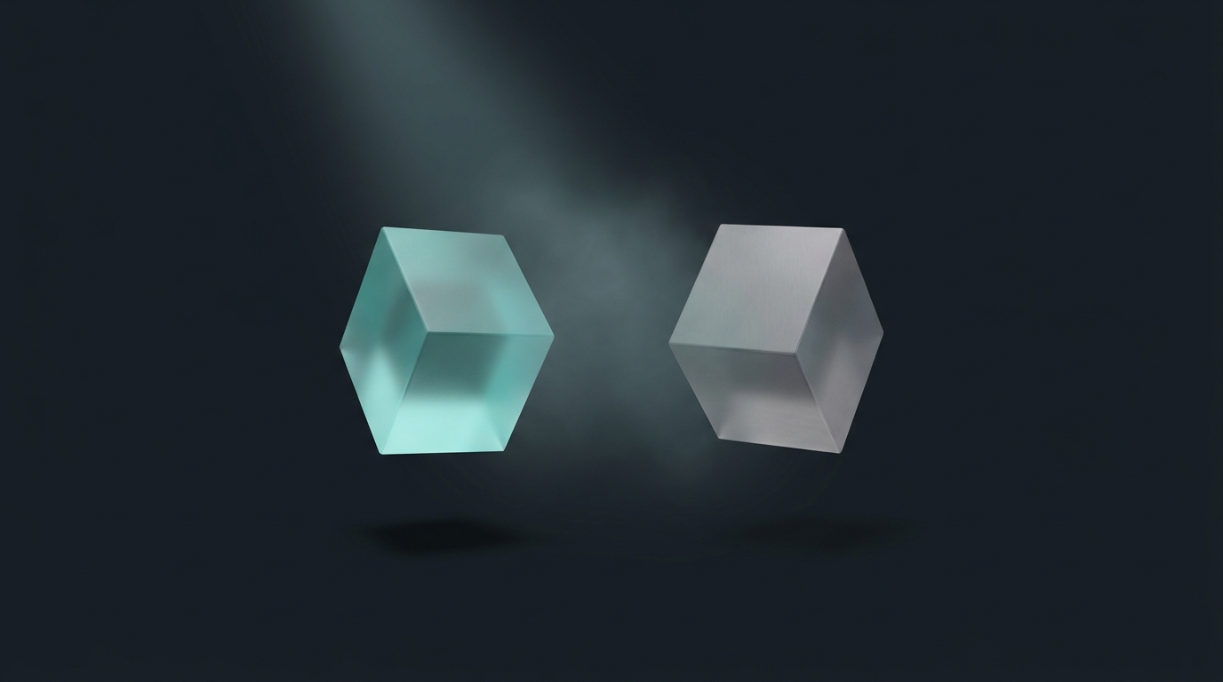 Two suspended geometric prisms facing each other, one cool teal, one gray, lit from a single left source against a deep slate background.