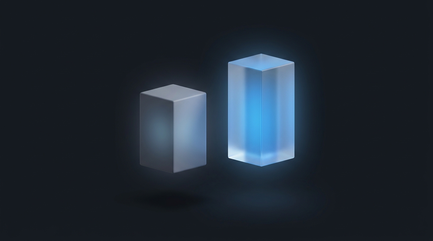 Two suspended geometric prisms side by side, one smaller and dimmer, one larger and glowing electric blue, on a deep slate background with soft directional lighting