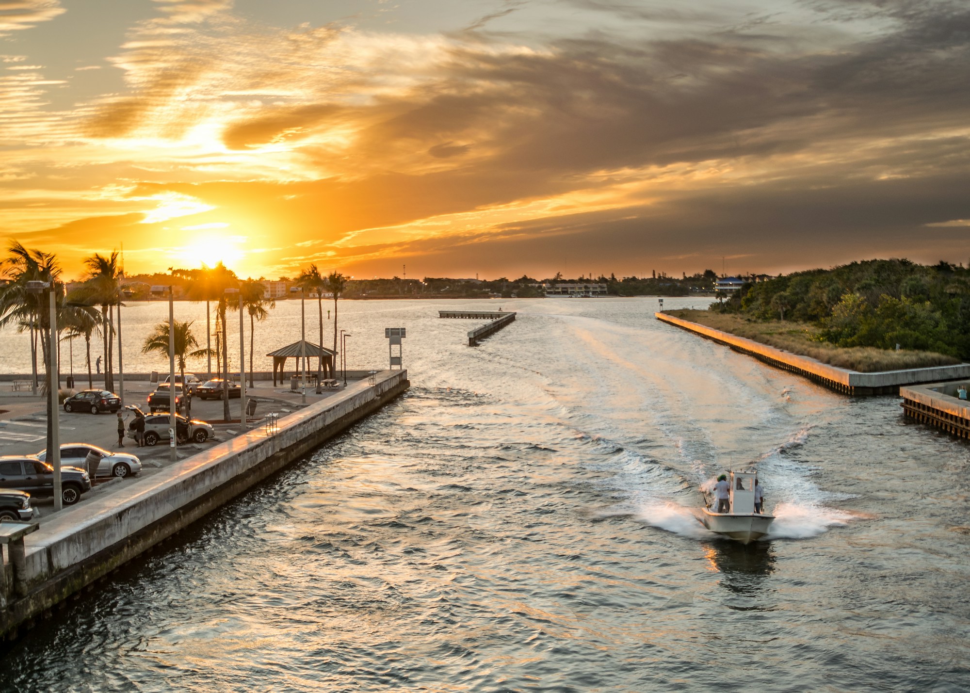 Family boating along Florida's intracoastal sunset