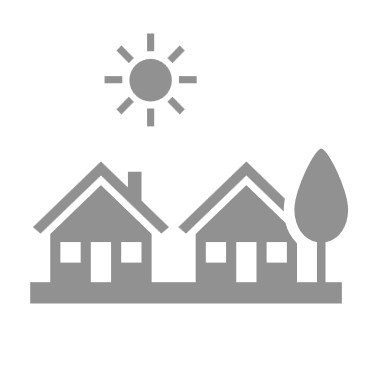 A grey icon of two houses on a street, with a tree near one and the sun shining high in the sky