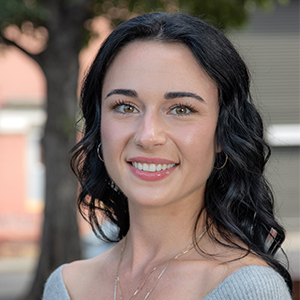 A headshot image of Dr Logan Linkston