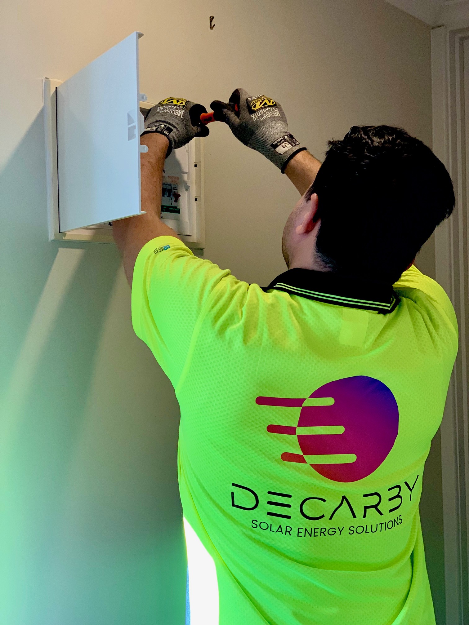 Decarby engineer carrying out precise electrical work on site