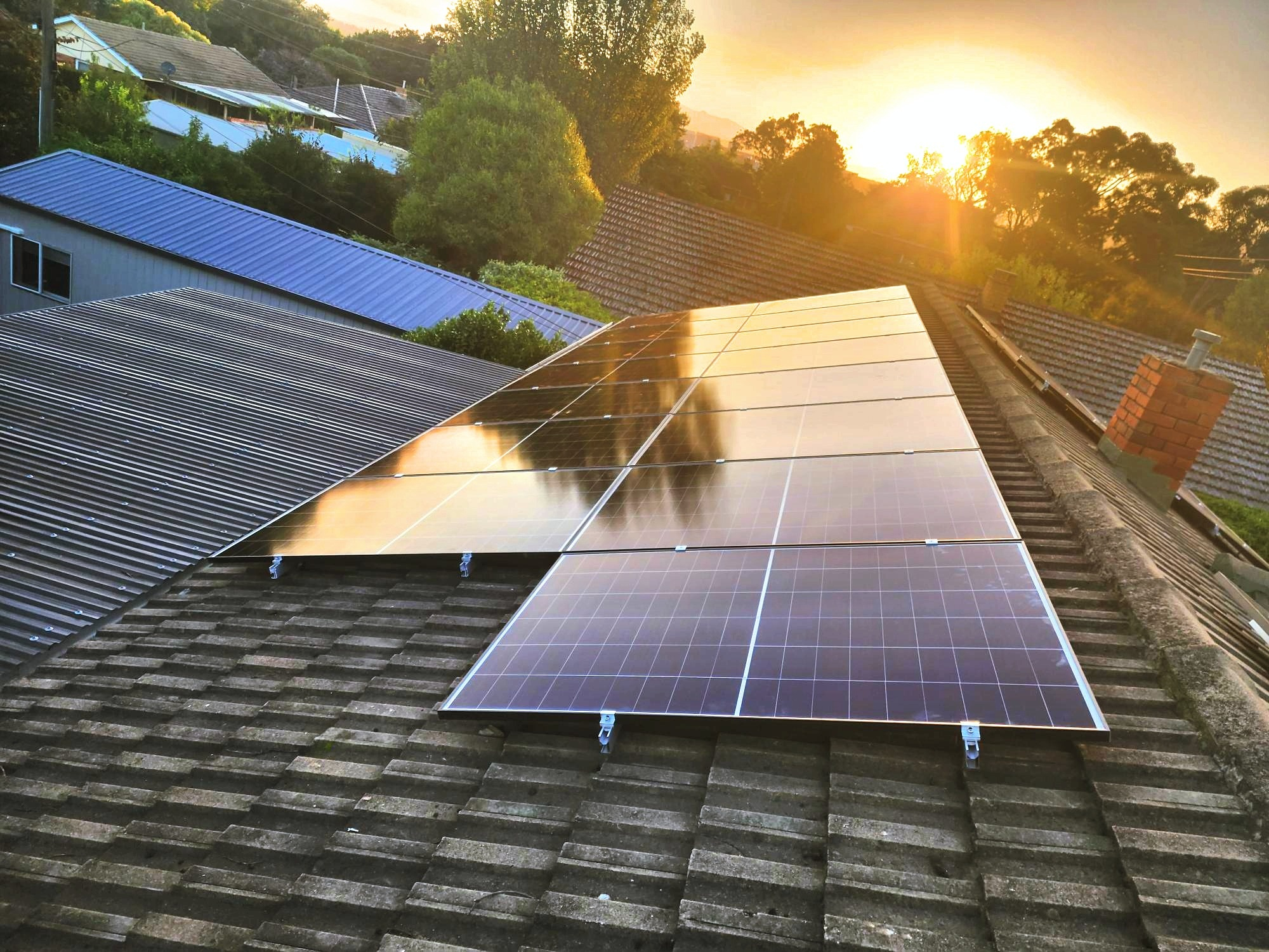 Finished Decarby residential rooftop solar installation on a tiled Canberra home