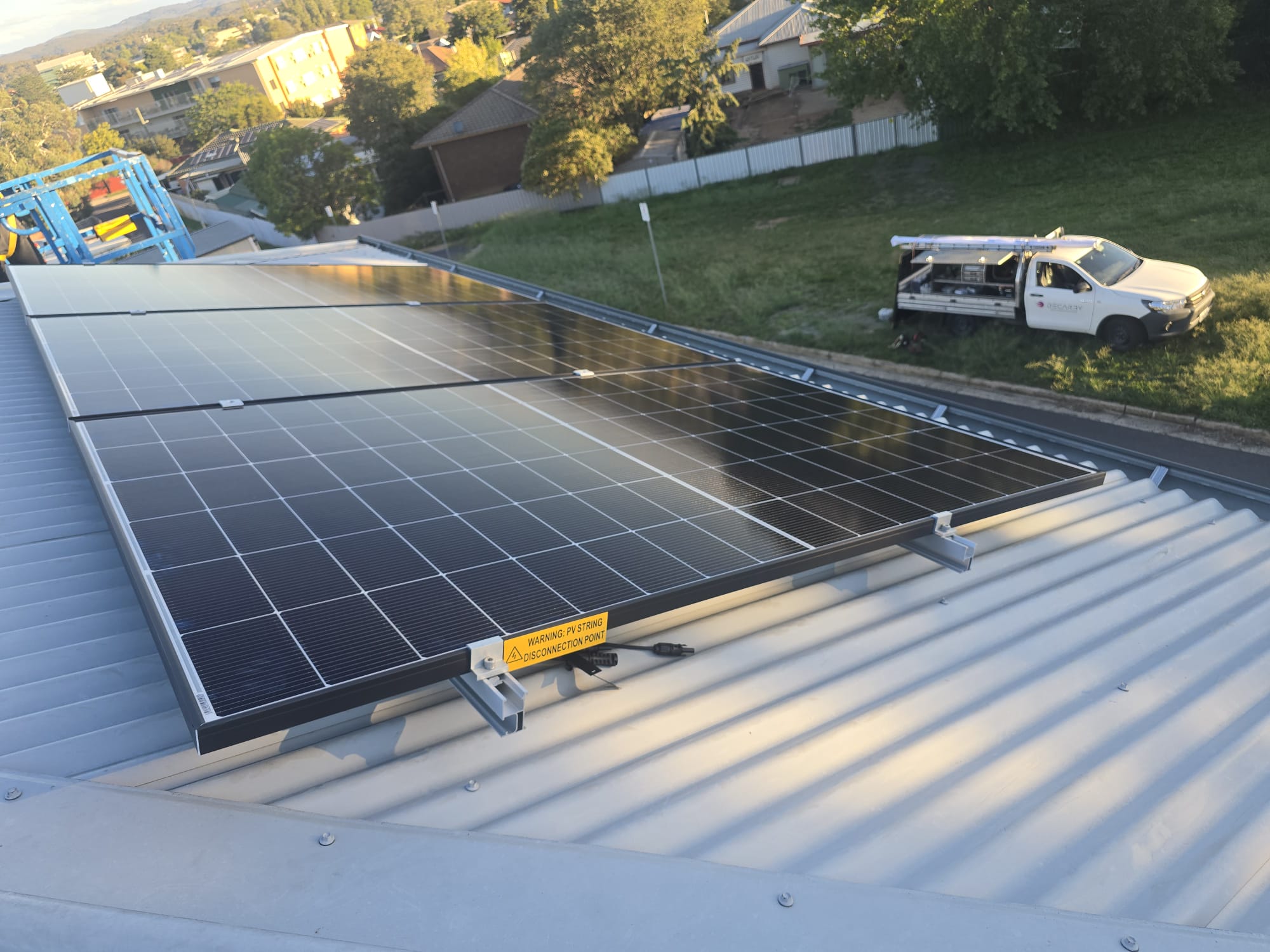 Decarby engineers and installers working on a residential solar project
