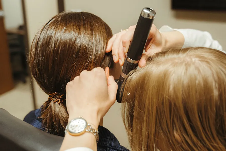 Close-up of earwax removal procedure performed by a hearing specialist