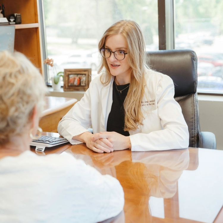 Patient and therapist during a cognitive behavioral therapy session for tinnitus relief