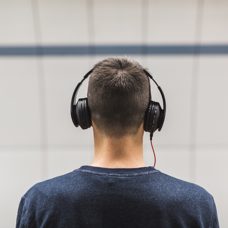 Patient wearing Neuromonics headphones during tinnitus sound therapy