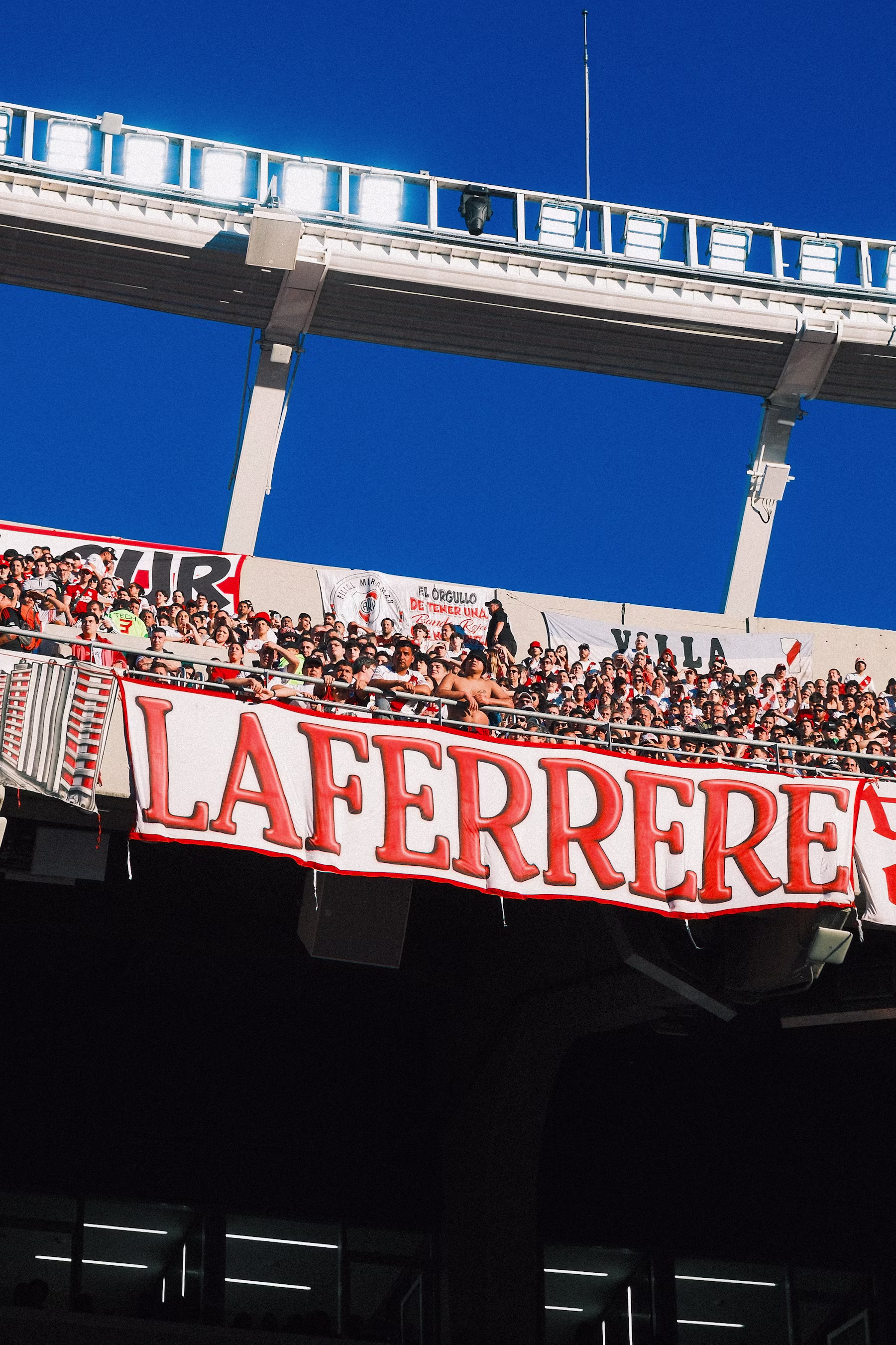 Football fans cheering in a stadium