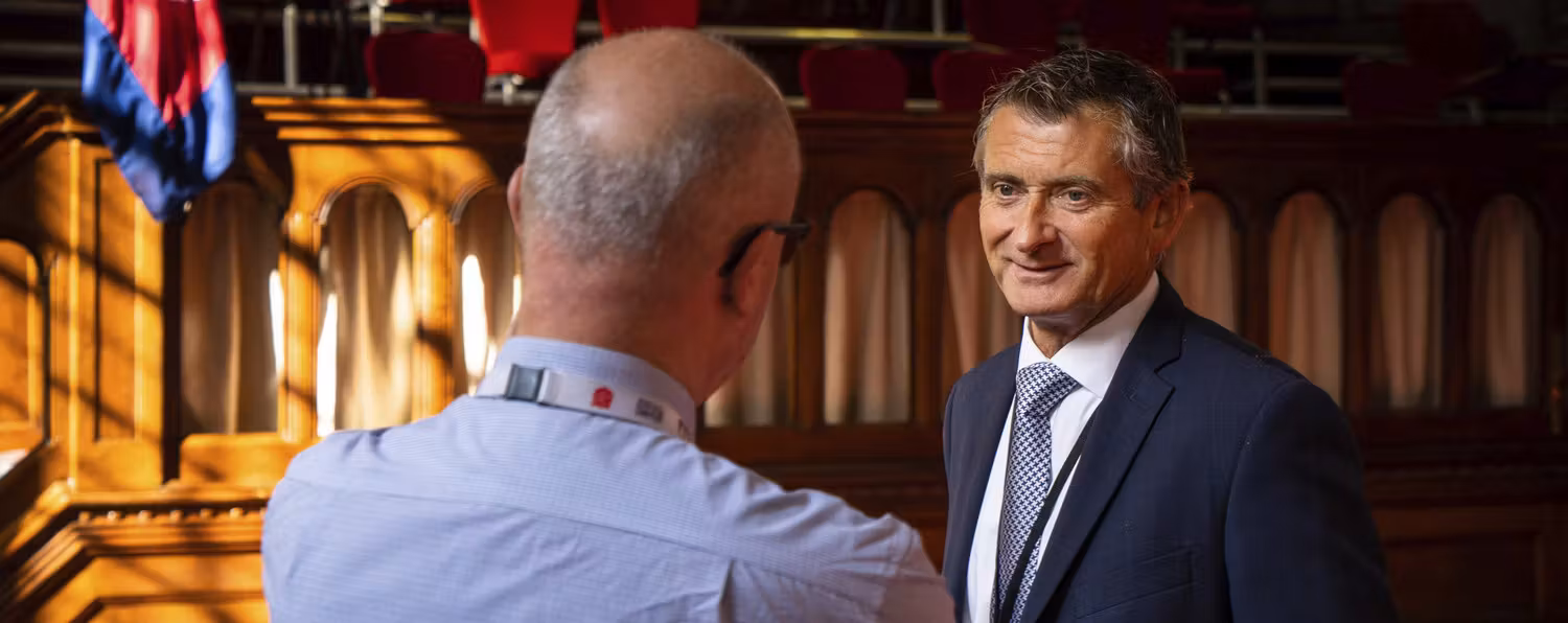 Two men talking