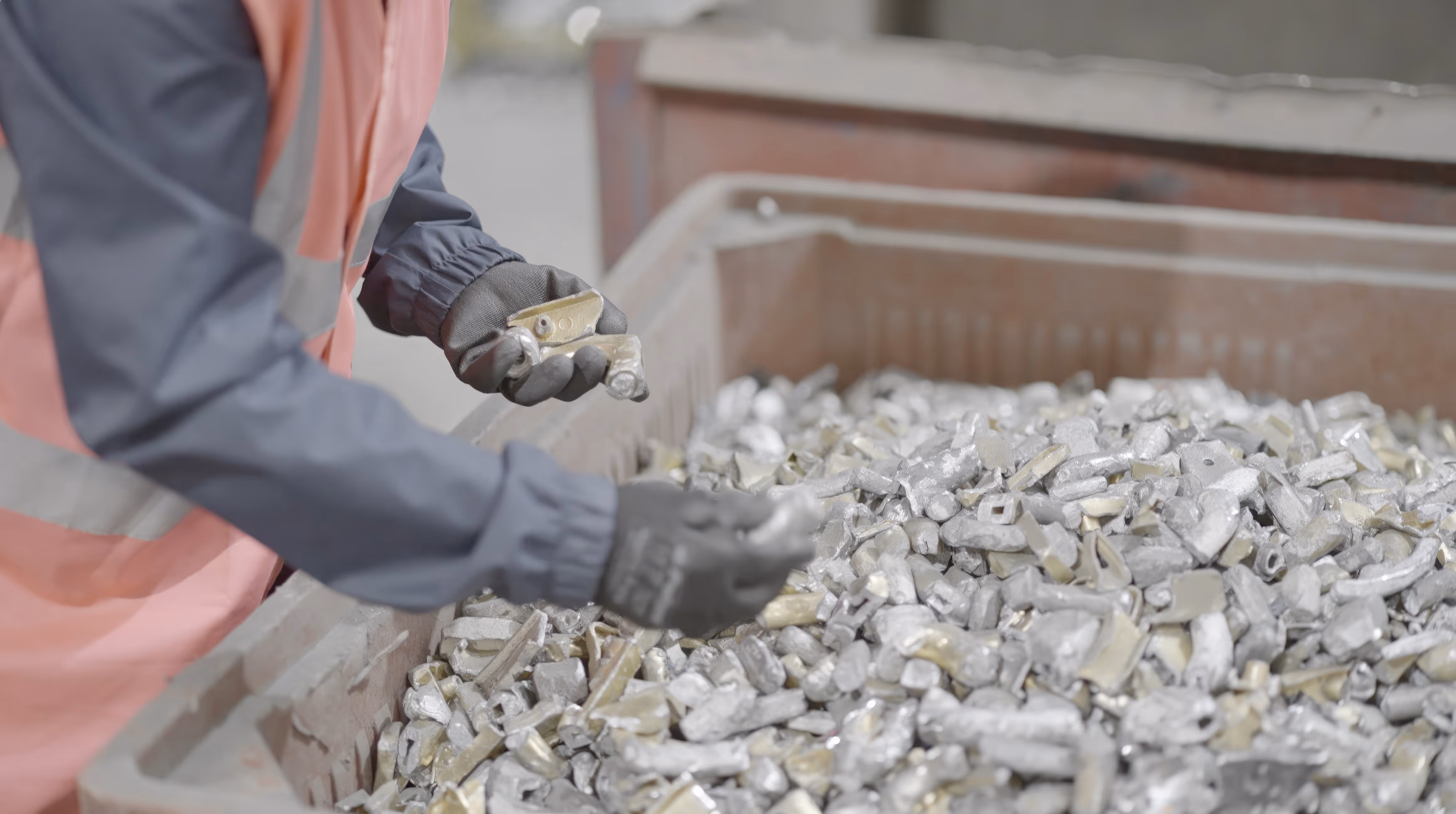 A person sorting rocks