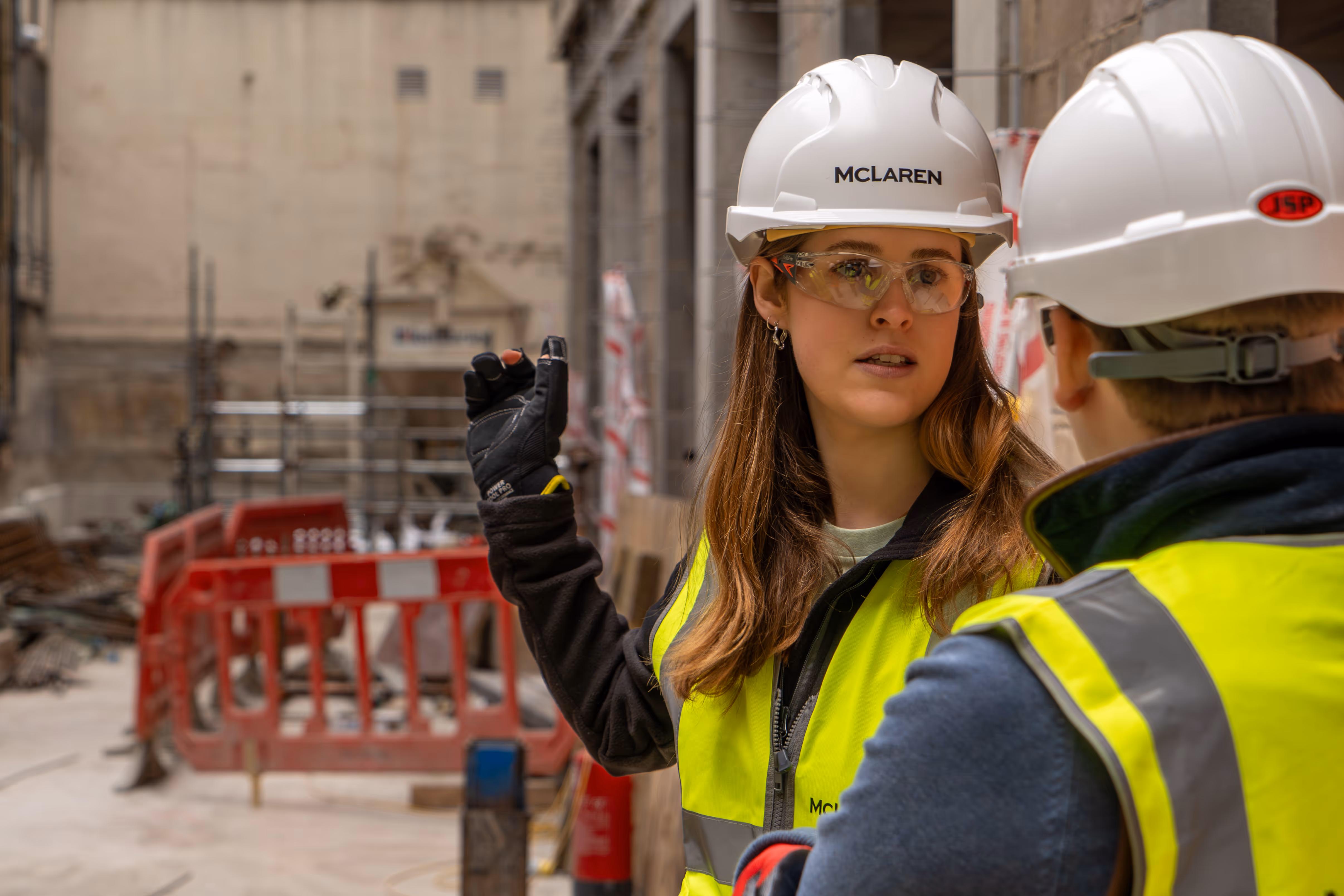Construction crew in conversation