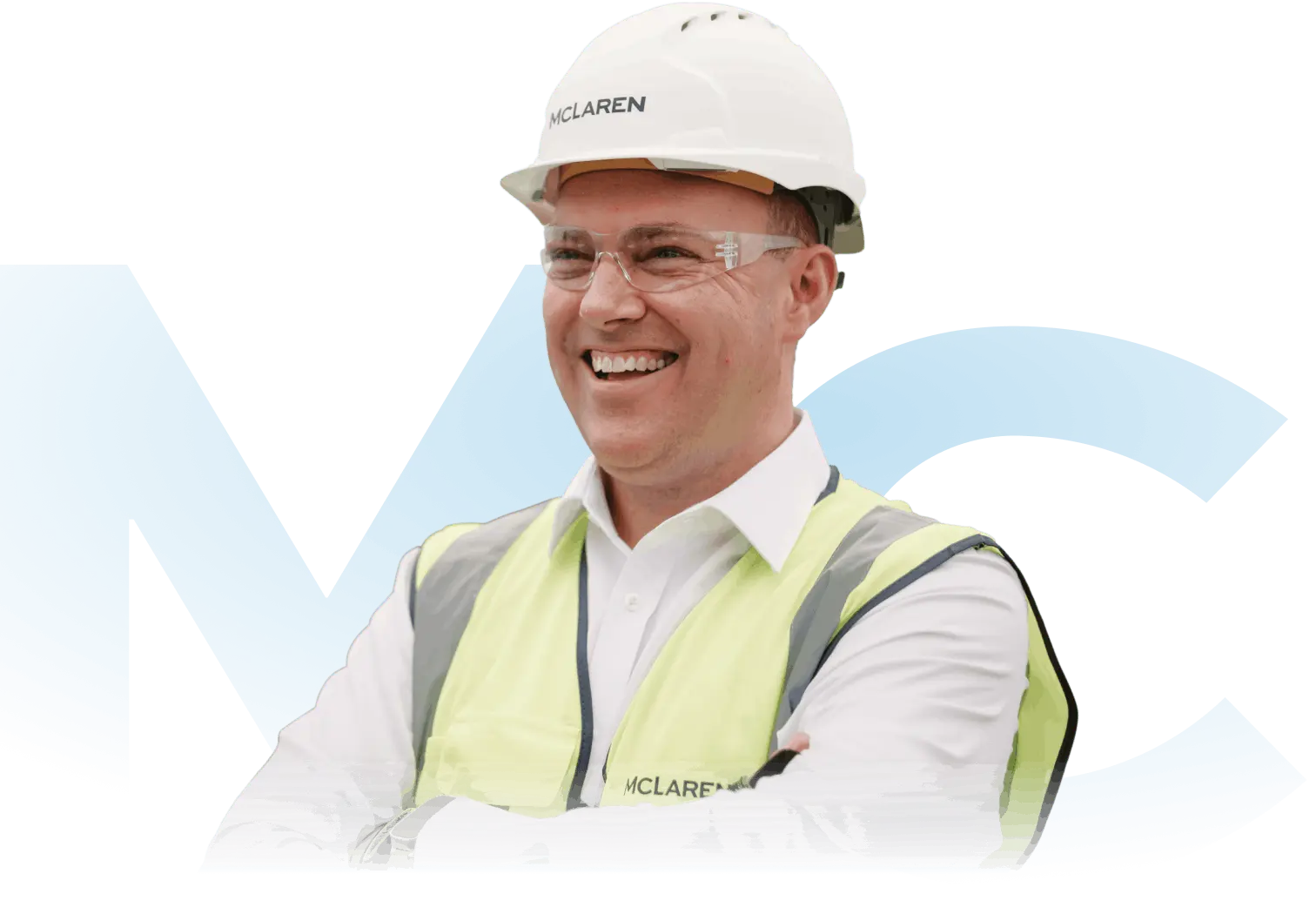 A man wearing a hard hat and safety vest.