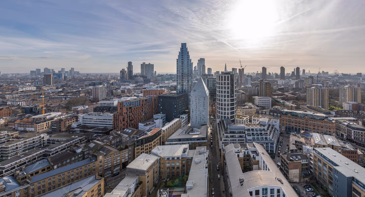 An aerial view of a city with tall buildings.