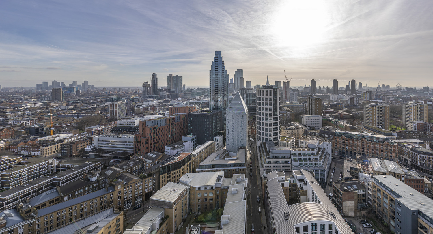 An aerial view of a city with tall buildings.