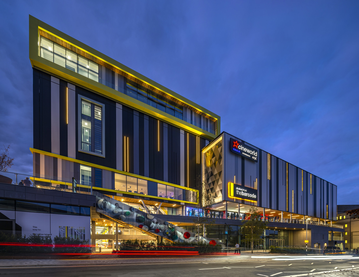 A large building with a lot of windows on it.