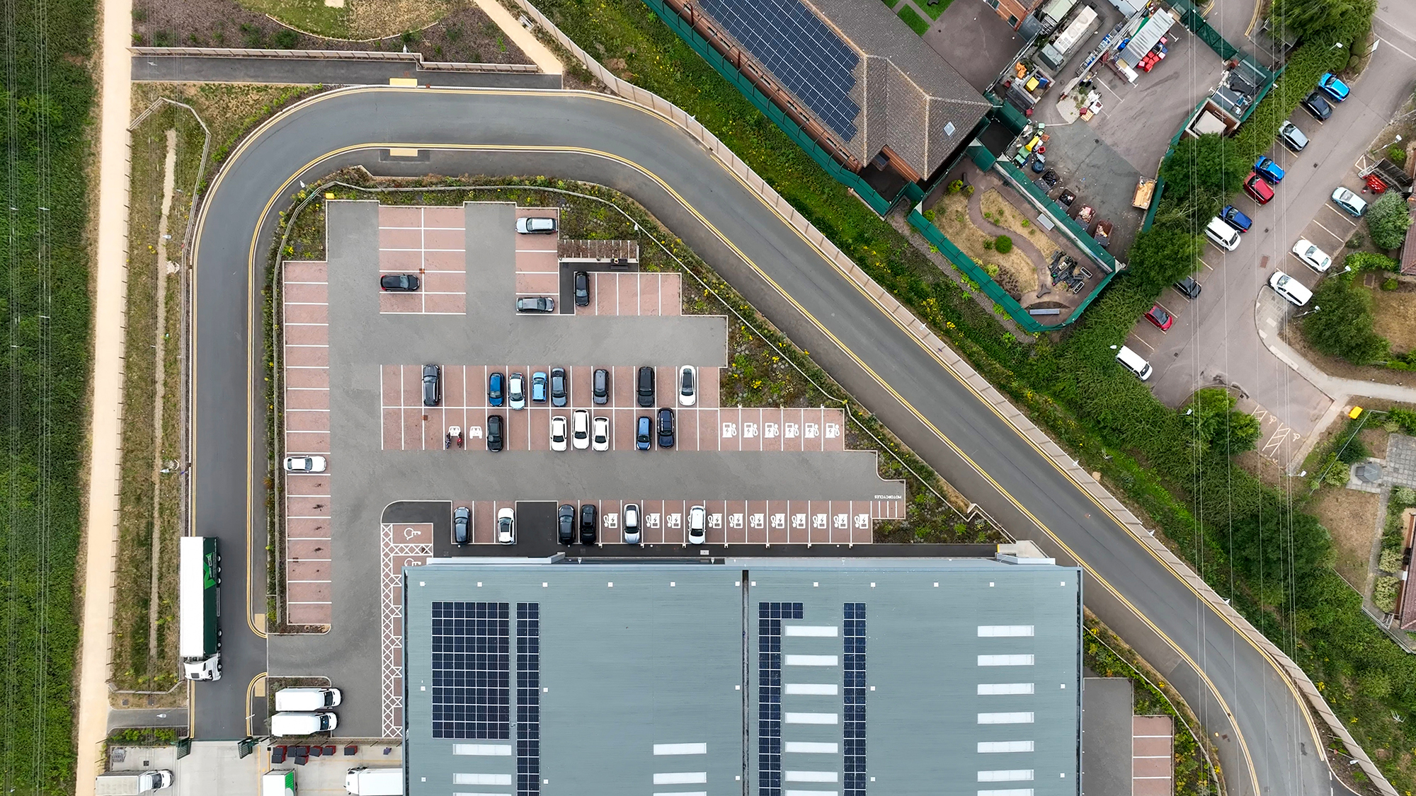 An aerial view of a parking lot and a parking lot.